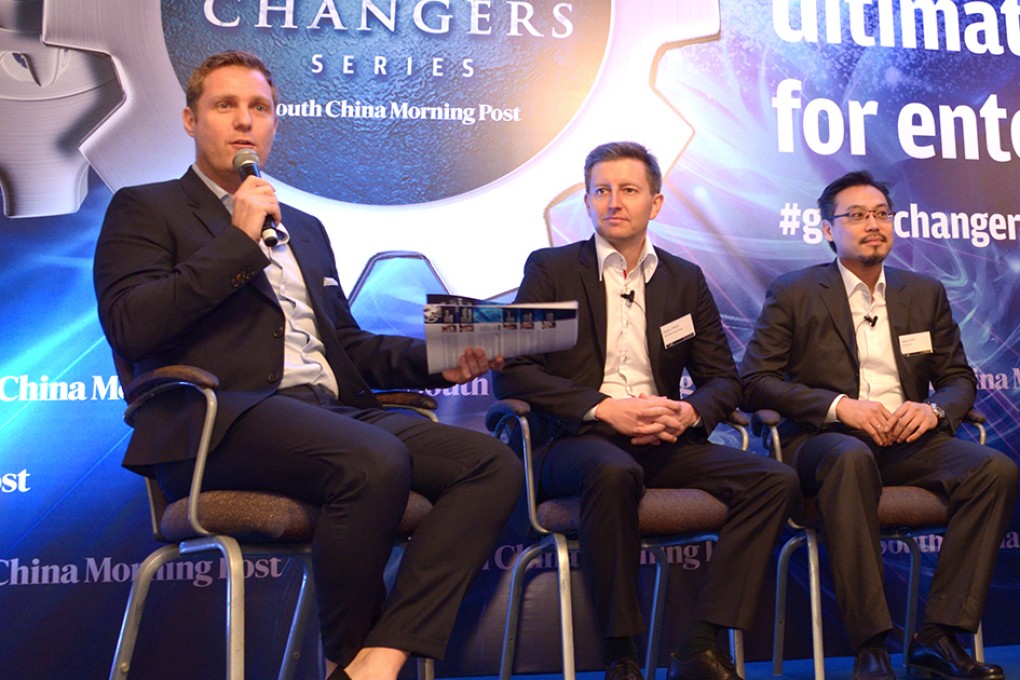 Simon Squibb (left), CEO of Nest Investments, speaks at the SCMP Game Changers forum. Photo: SCMP Pictures