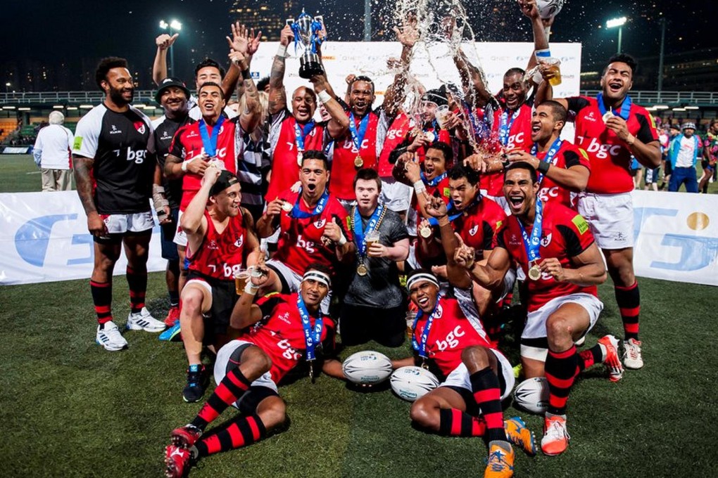 The BGC Asia-Pacific Dragons celebrate their victory in the Cup final at the GFI HKFC Tens on Thursday night. Photos: SCMP Pictures