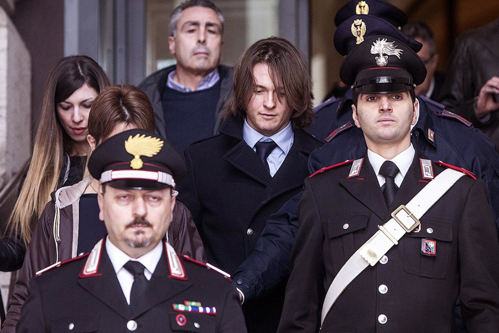 Raffaele Sollecito leaves Italy's highest court building in Rome. Photo: EPA