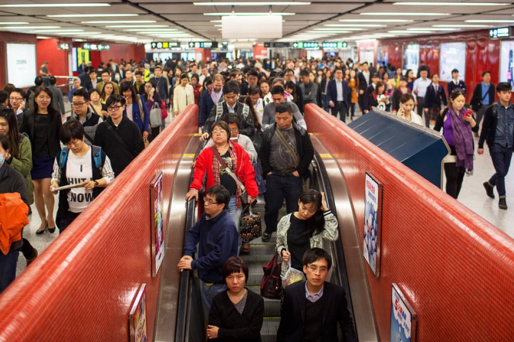 The MTR Corp last week announced HK$220 million of concessions for travellers this year, in the form of a discount of 10 per cent on a passenger's second trip of the day. Photo: Bloomberg