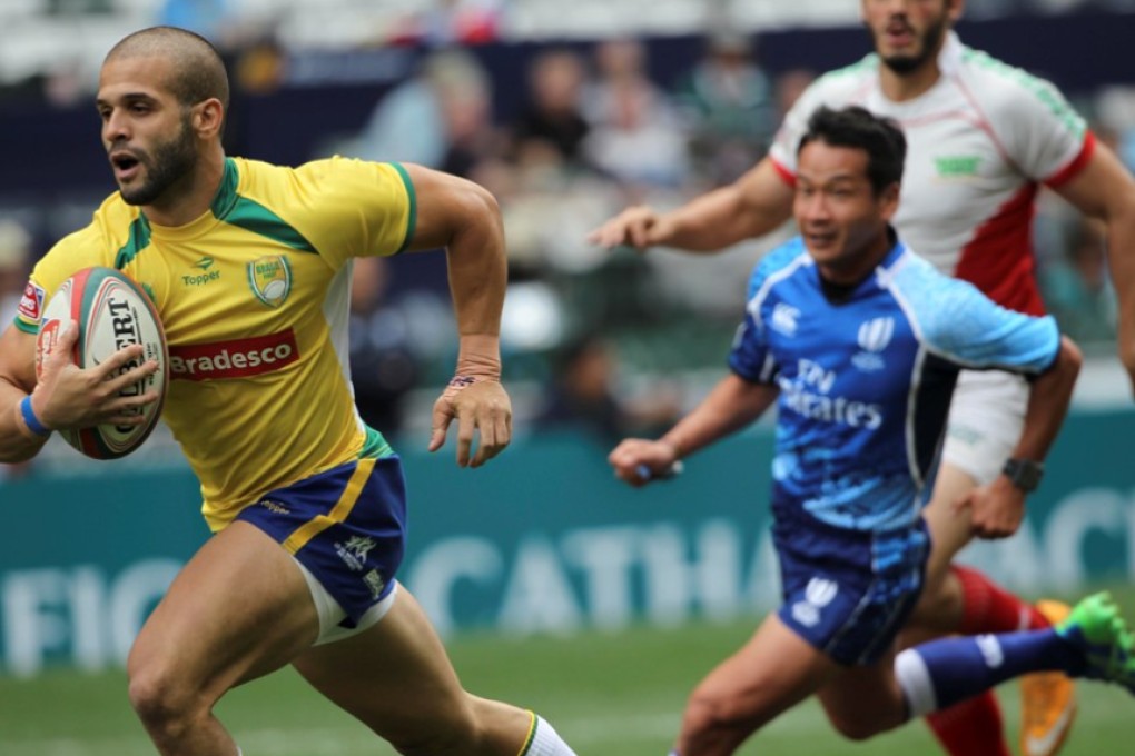 Allan Martins runs in one of his two tries against Mexico to lift Brazil into the knockout stages of the Sevens World Series qualifier. Photo: Nora Tam/SCMP