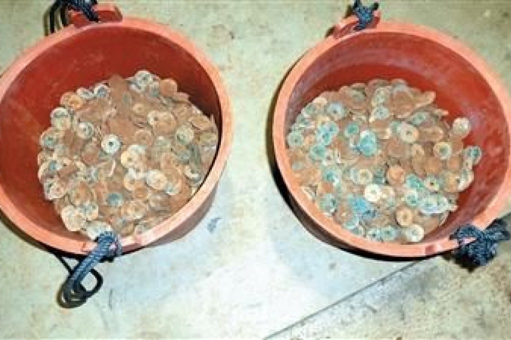 The ancient Chinese coins dated back to 1,000 years ago. Photo: 163.com