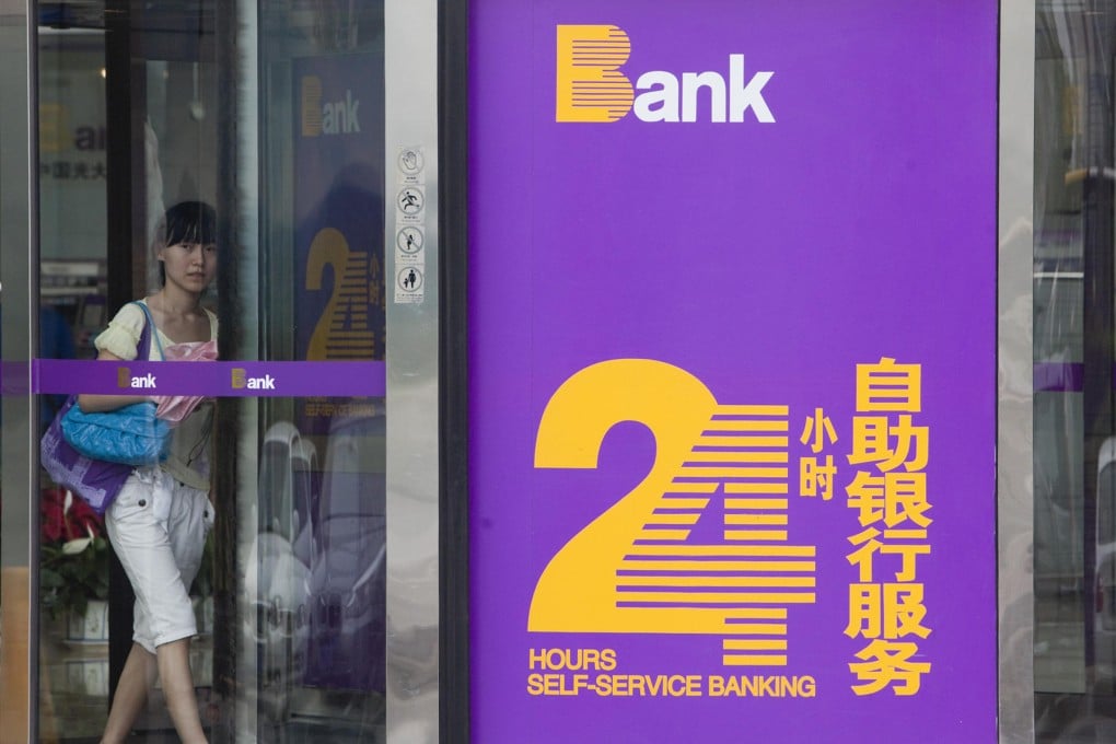 Everbright's impairment losses increased 120 per cent to 10.2 billion yuan, a sign banks are being hurt by slower growth. Photo: Bloomberg