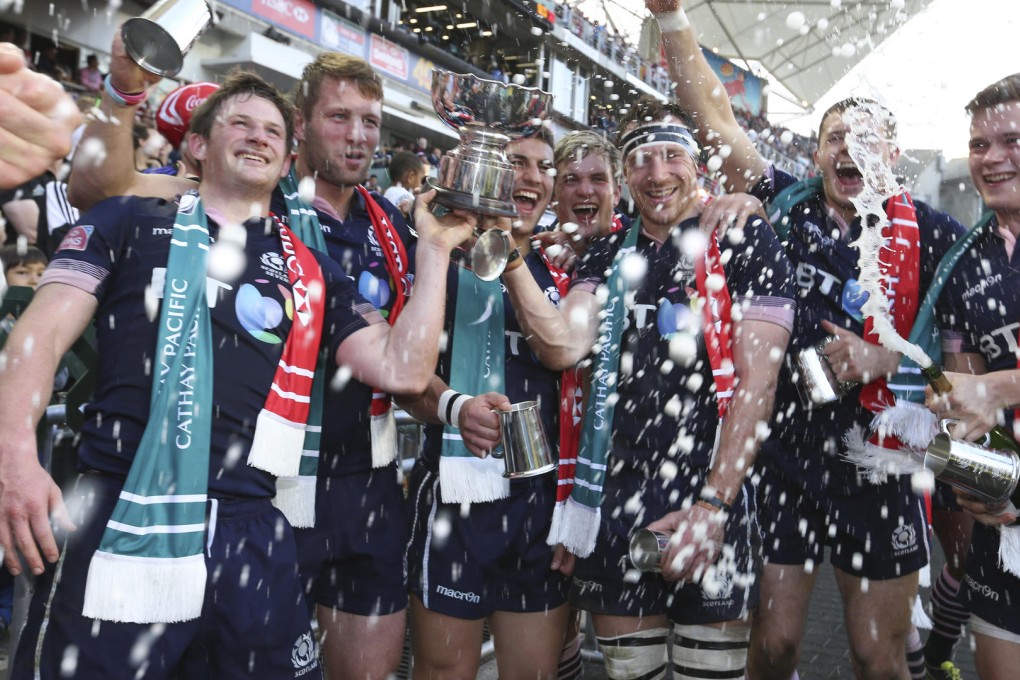 Proud Scotland players celebrate after defeating France 26-5 in the Bowl final to take some silverware back home. Photos: Sam Tsang/SCMP