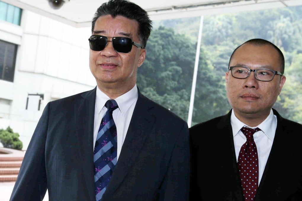 Lew Mon-hung (left) turns up in court yesterday. Photo: K. Y. Cheng