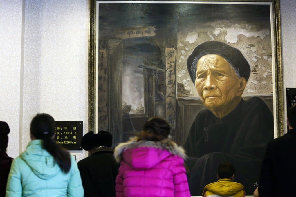 Visitors file past exhibits at the Modern Filial Piety Culture Museum in Guyi, Sichuan province. Photo: AFP