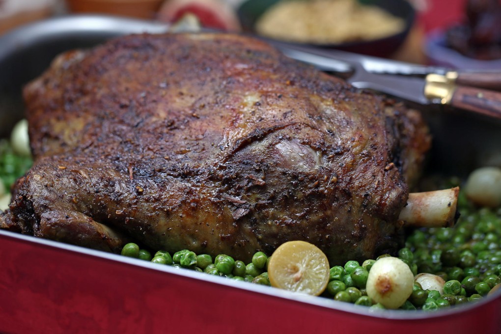 Slow-cooked lamb shoulder with ras el hanout, preserved lemon and peas. Photography: Jonathan Wong
