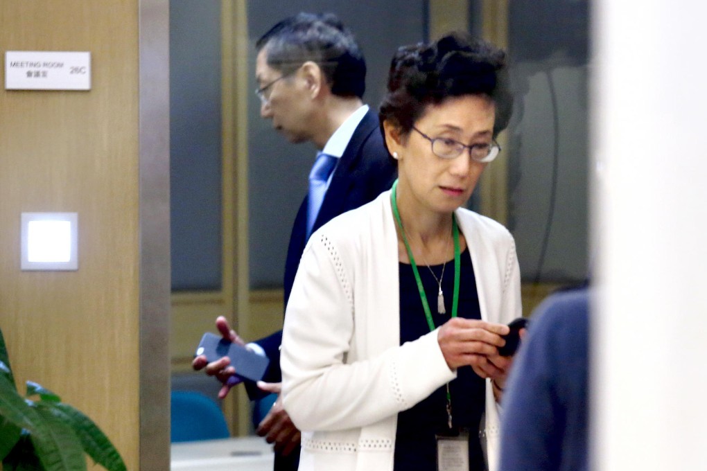 Iris Tam and Victor So at yesterday's URA board meeting, a day after she quit. Photo: Nora Tam