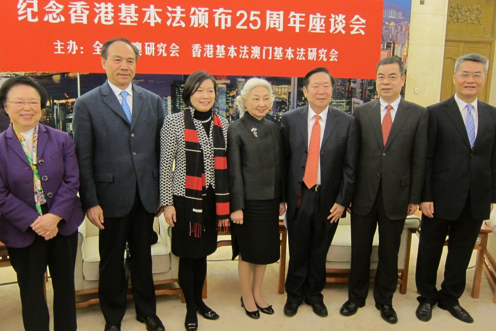 (Left to right) Maria Tam; Zhou Bo, of the Hong Kong and Macau Affairs Office; lawmaker Dr Priscilla Leung Mei-fun; Basic Law Committee vice-chairwoman Elsie Leung Oi-sie; Chen Zuoer; Zhang Rongshun; and Huang Lanfa, deputy director of the central government''s liaison office in Hong Kong.