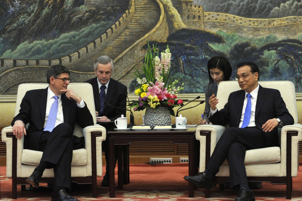 US Treasury Secretary Jacob Lew, left, meets Premier Li Keqiang at the Great Hall of the People in Beijing on Monday. Photo: AFP