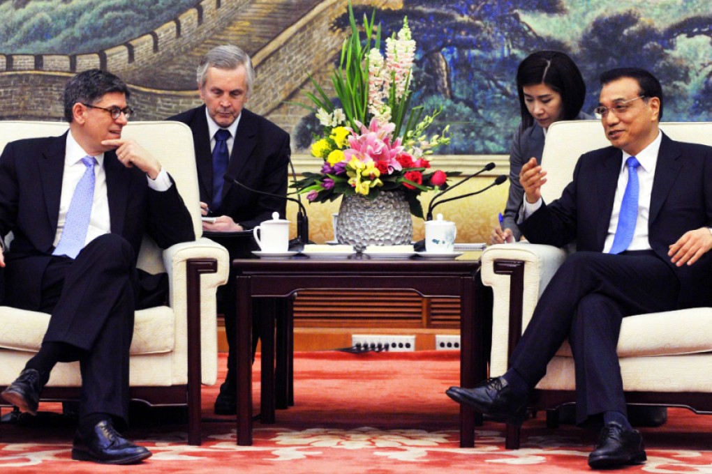 Li Keqiang (right) with US Treasury Secretary Jack Lew. Photo: AFP