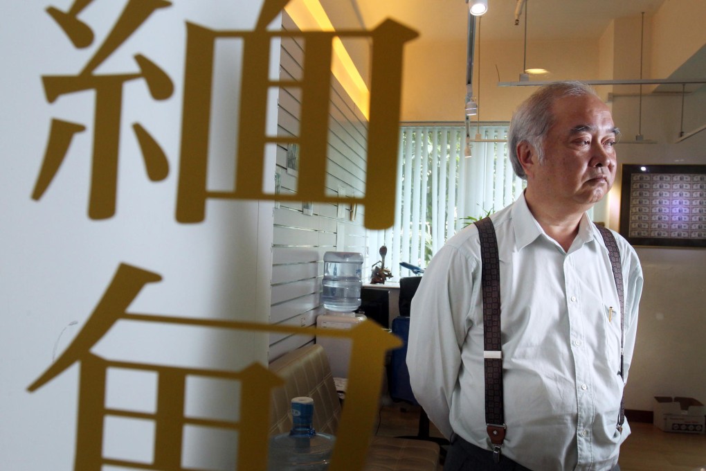 Law Yiu-keung reflects on his misfortune in his Tsuen Wan office. He says he has lost at least HK$2 million. Photo: May Tse