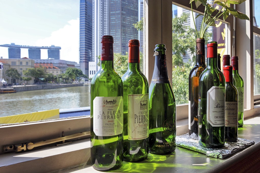 Under the new law, the consumption of liquor is banned in all public places nationwide from 10.30pm to 7am daily. Photo: AFP