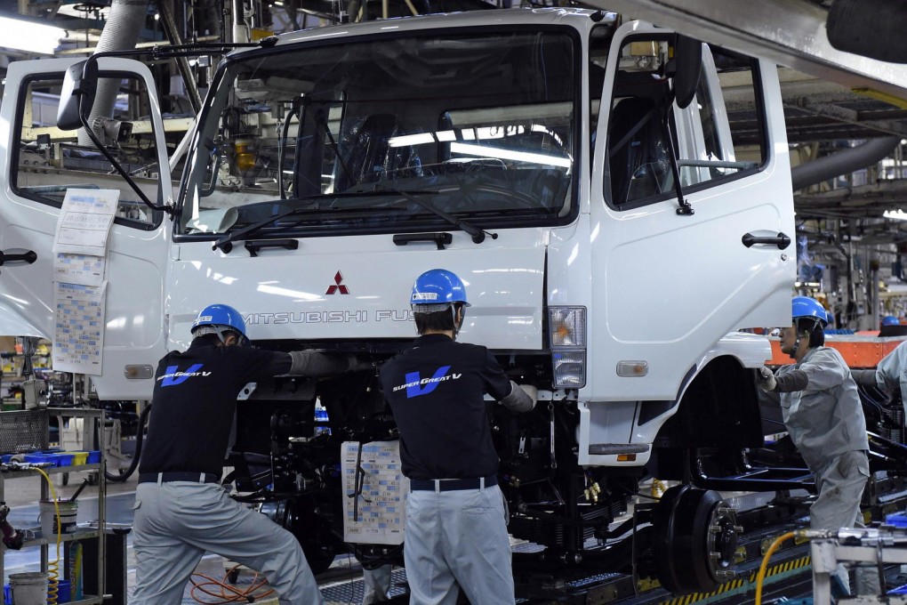 The Bank of Japan's closely watched economic survey showed confidence at the country's biggest manufacturers remained flat at plus 12 in March. Photo: AFP