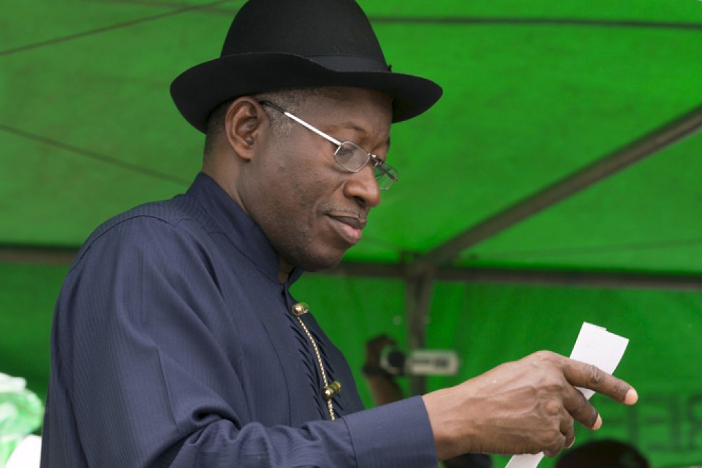 Nigerian leader Goodluck Jonathan casts his ballot. He has conceded defeat in the election. Photo: Reuters