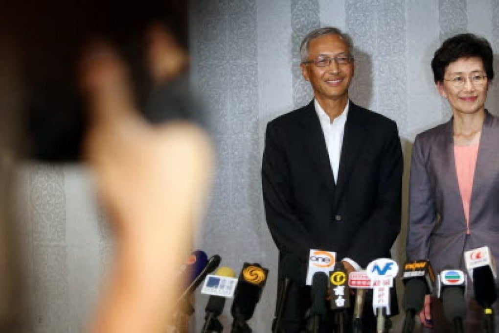 In happier times: Iris Tam with newly appointed URA chairman Victor So in June 2013. Photo: Sam Tsang