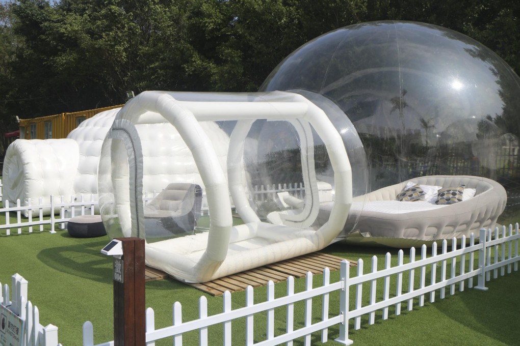 Mingle Farm offers a range of accommodation from igloo-like tents (above) to bouncy castles (below).