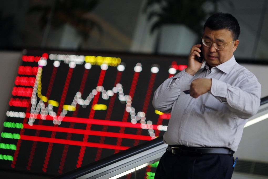 Turnover under the stock connect scheme has not been as good as expected since its launch late last year, especially for southbound trades. Industry professionals are looking to the tax treaty changes between Hong Kong and mainland China to make a difference. Photo: Reuters