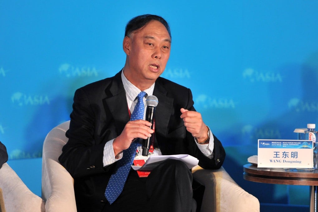 Citic Securities chairman Wang Dongming expects a series of mergers in the financial industry. Photo: Xinhua