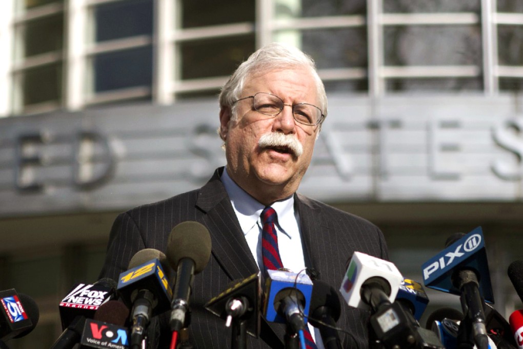 Thomas Dunn, the lawyer for Asia Siddiqui, talks to reporters outside U.S. Federal Court in Brooklyn during the arraignment on terrorism charges of two Queens women. Photo: AFP