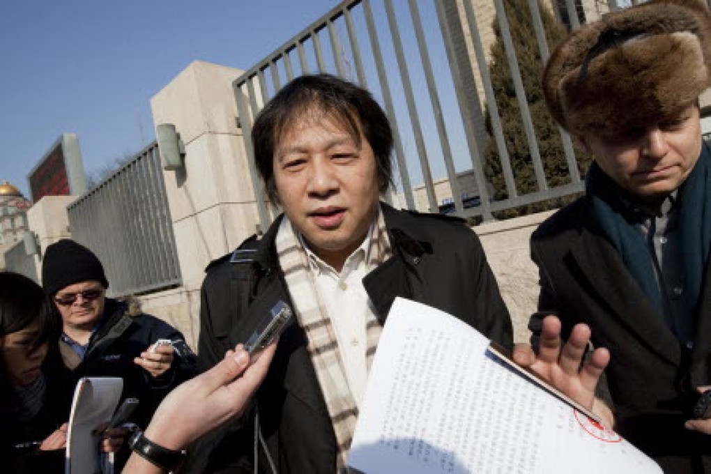 Tong Wei, the lawyer for jailed US geologist Xue Feng, speaks to the press in this file photo from 2011. Photo: Bloomberg