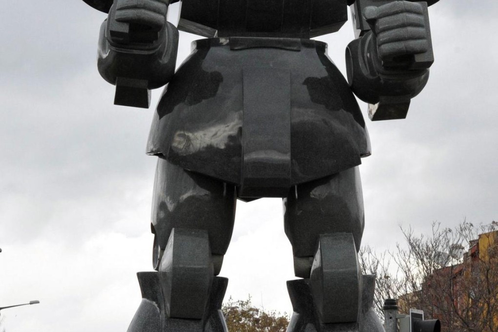 The robot statue towers over a road junction.Photo: AFP