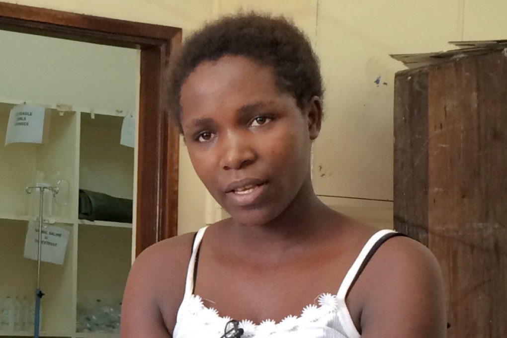 Nineteen-year-old Cynthia Cheroitich prayed. Photo: AP