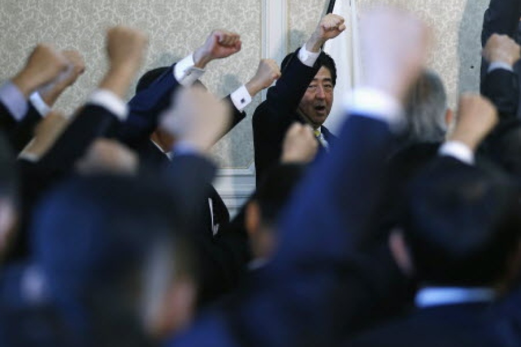 Japan, under Prime Minister Shinzo Abe, has gone hell for leather to create 2 per cent inflation. Photo: Reuters