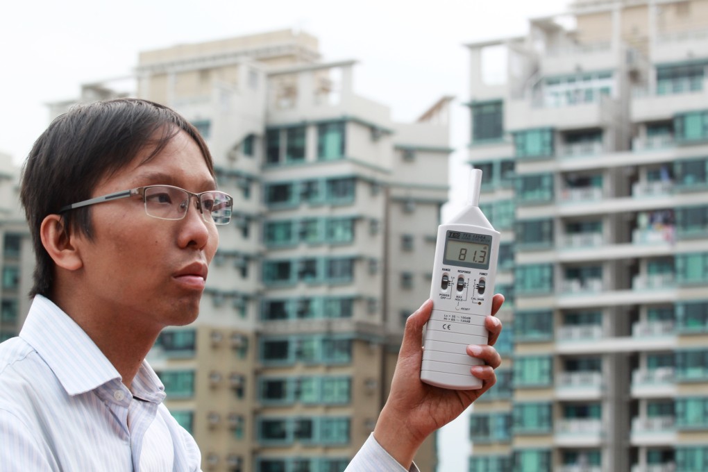 Green Sense’s Roy Tam measures decibels. Photo: Dickson Lee