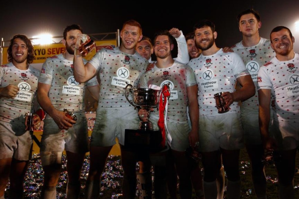 England celebrate with the Cup after beating South Africa 21-14 at the Japan Sevens on Sunday. Photo: World Rugby