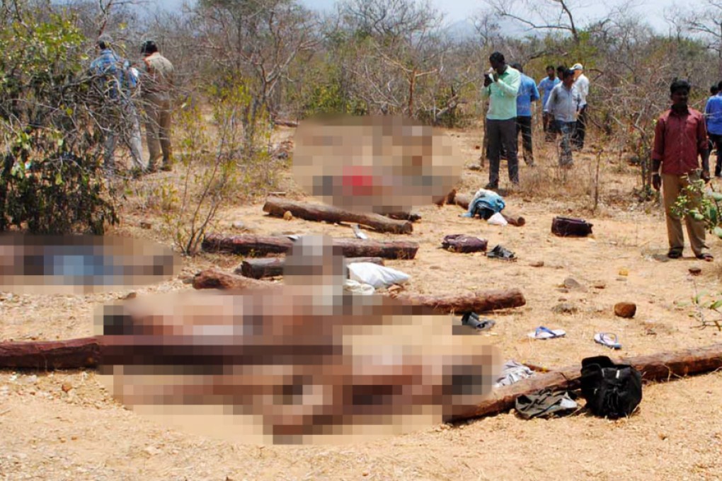 The bodies of suspected sandalwood smugglers, who were killed in an encounter with a joint team of special police and forest personnel. Photo: AFP