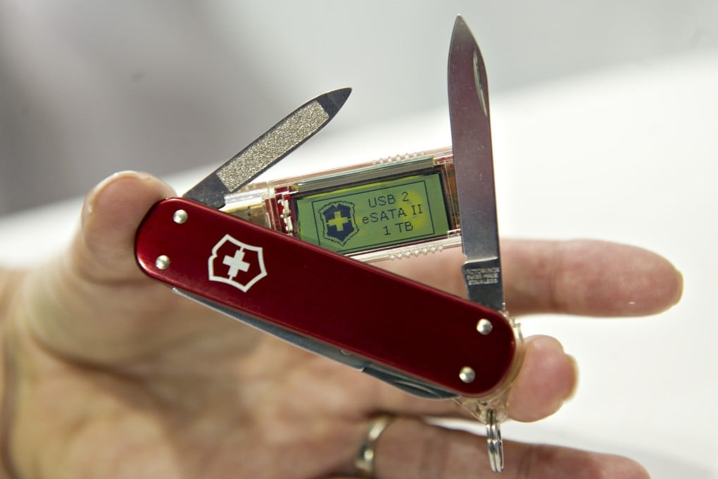 A Swiss army knife featuring a one terabyte USB drive. Maker Victorinox is launching a smart watch to compete with Apple. Photo: Bloomberg
