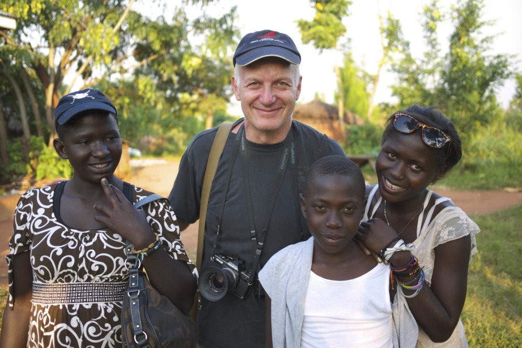 British photojournalist Nick Danziger in Uganda. He tried to go back to painting at one point, but couldn't adjust. Photo: Miles Warde