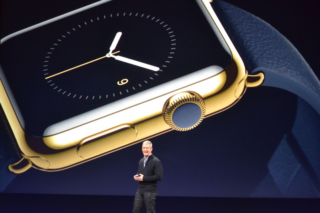 Apple CEO Tim Cook unveils details of the Apple Watch during an event in San Francisco on March 9, 2015. Photo: Kyodo