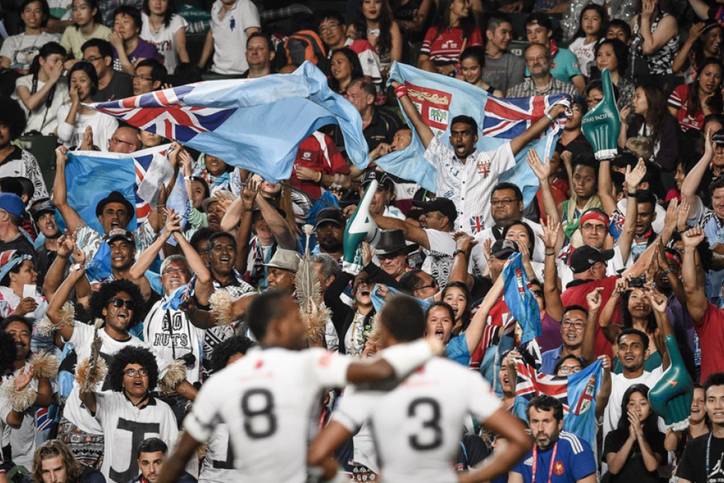 Fans at the 40th edition of the Hong Kong Sevens salute Fiji following their 33-19 Cup final triumph over New Zealand. Photo: AFP