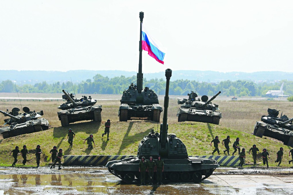 The Russian military takes part in a rehearsal for an industrial exhibition. Moscow sees projects in Uganda and Zimbabwe as door openers for future arms sales in Africa. Photo: EPA