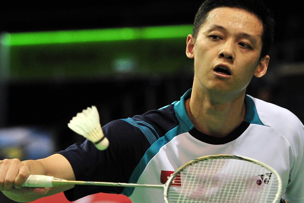 Hong Kong's Hu Yun on his way to victory against China's Chen Long at the Singapore Open. Photos: Xinhua
