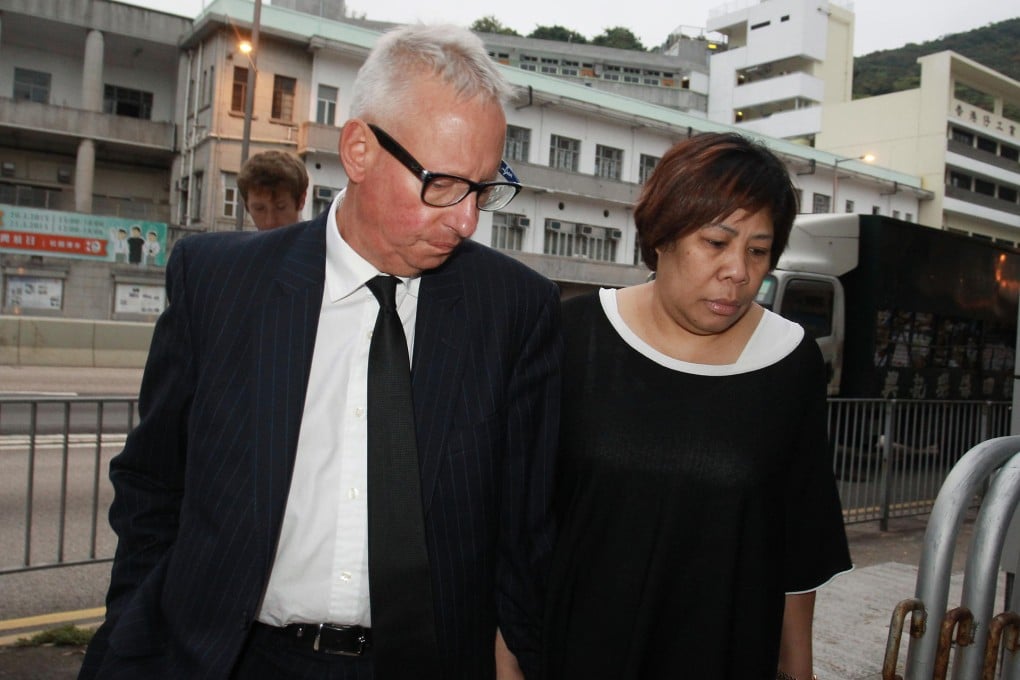 Nick Cousins and his partner Herminia Garcia after she reported to Aberdeen police station yesterday. Photo: Dickson Lee