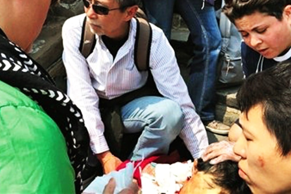 The victim’s husband said Canadian woman was running down steps on a steep section of the Great Wall when she collided with his wife. Photo: SCMP Pictures