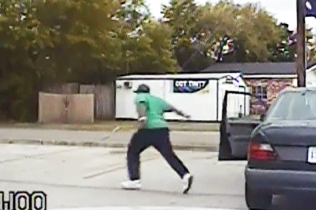 Walter Scott bolts from the scene of a traffic stop in this April 4 dash-cam video. Moments later he was shot dead by police officer Michael Slager. Photo: Reuters