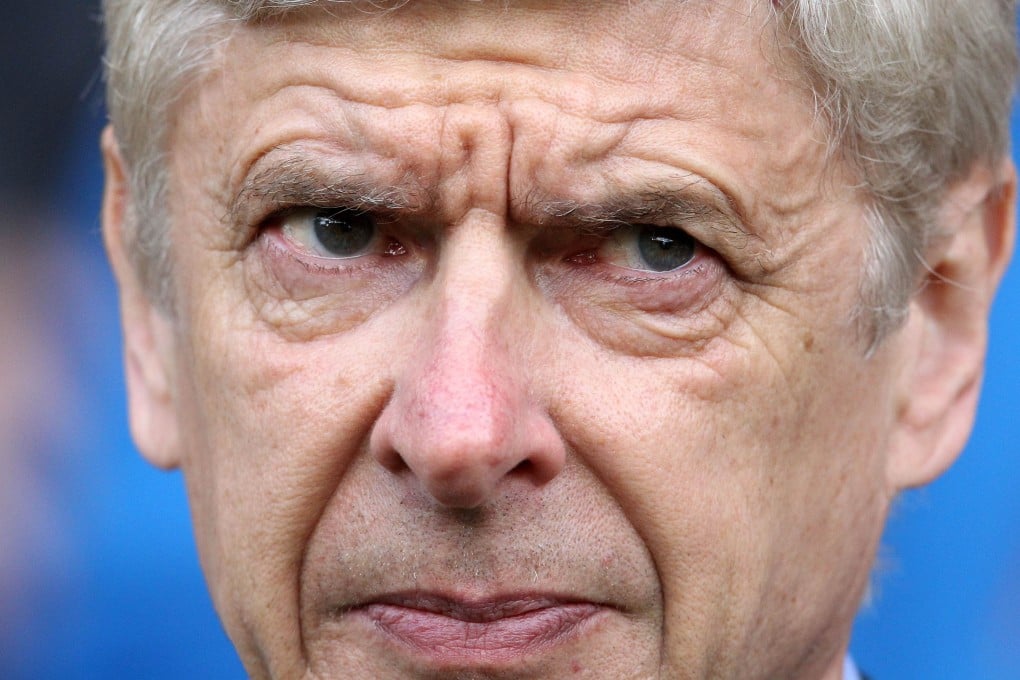 Arsene Wenger knows the title is out of his team's hands. Photo: AFP
