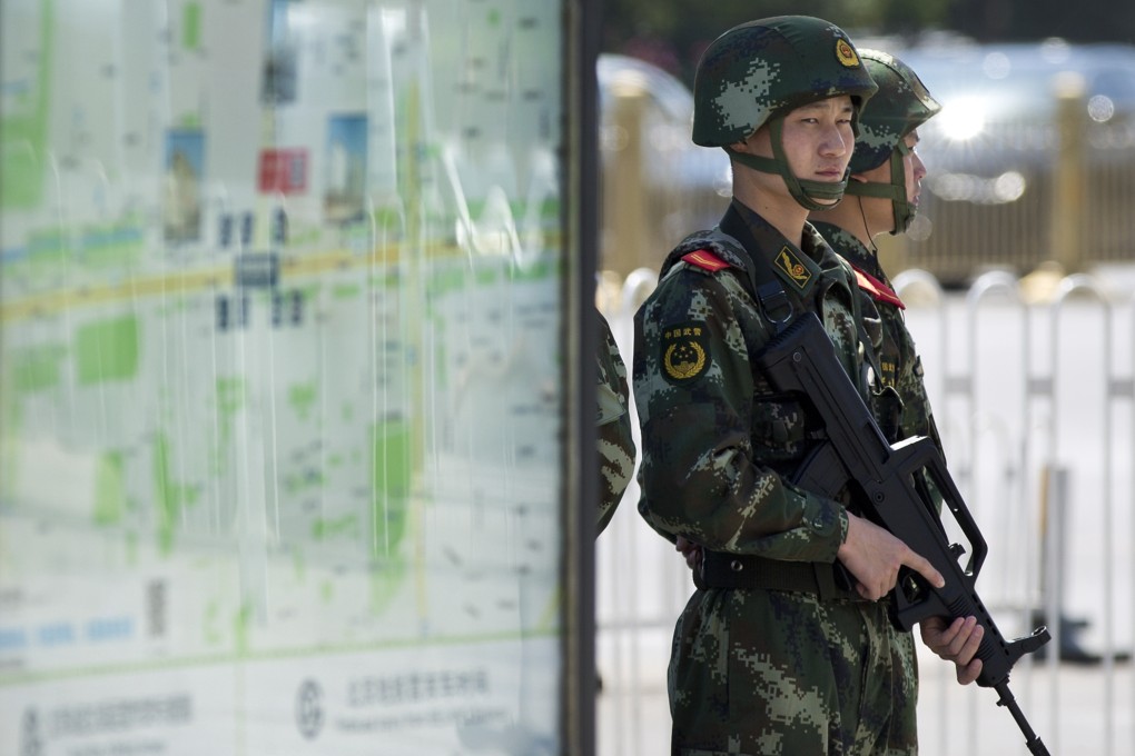 Armed police deployed on the streets of Beijing last year. Photo: Associated Press