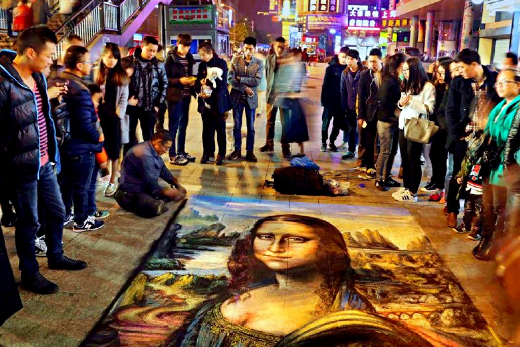 The Chinese beggar has studied at some of the nation's best art institutes over the years, but prefers to make a living from his street drawings. Photo: dfic.com