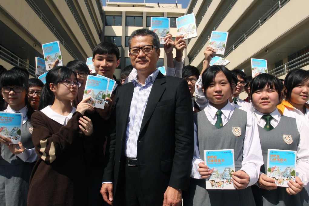 Paul Chan told a group of secondary school pupils of his childhood in a ramshackle squatter camp in Shek Kip Mei. Photo: May Tse