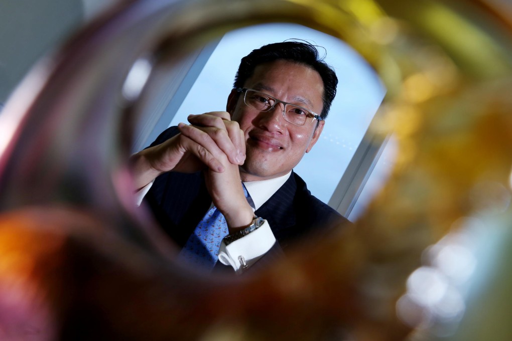 New Century's Derek Cheung would like more mainland property owners to list their real estate assets as Hong Kong reits. Photo: Nora Tam