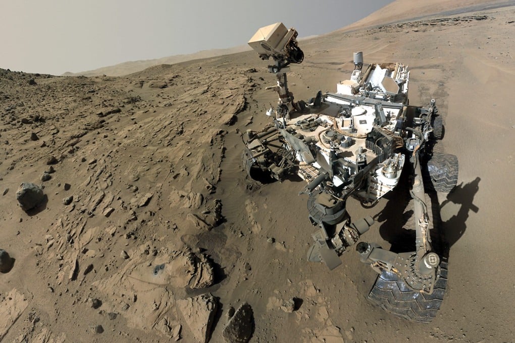 A composite "selfie" taken by the Curiosity rover on the Martian surface. The image was reconstructed from dozens of component images taken by a camera on the rover's arm last year. Photo: EPA