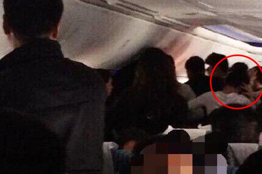 A photograph taken by a passenger shows the women allegedly fighting one another during the flight. Photo: SCMP Pictures