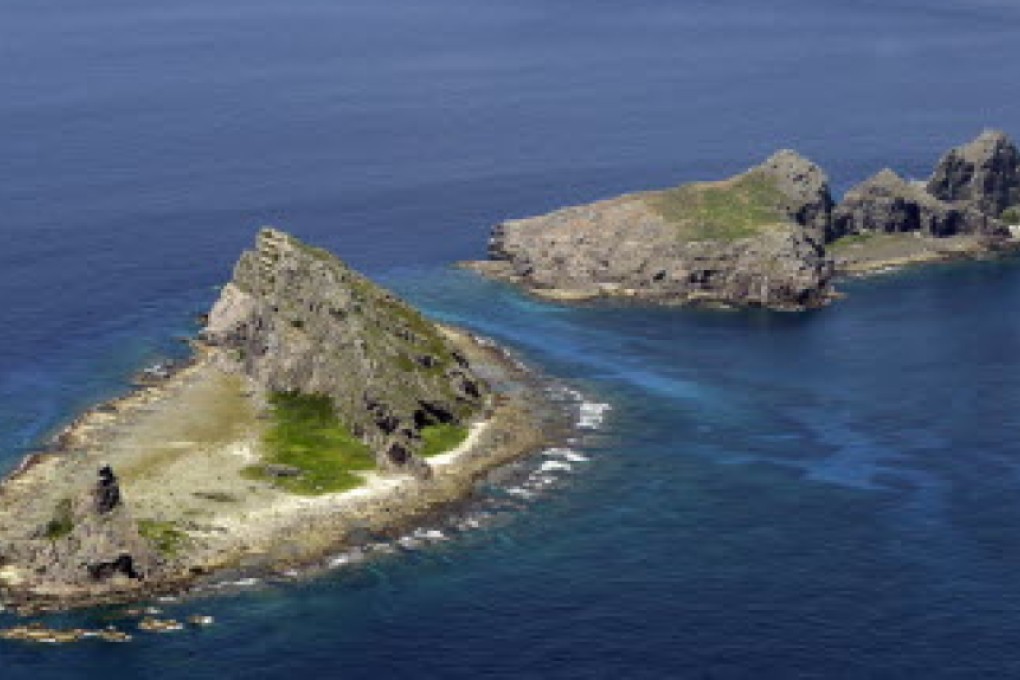The tiny islands in the East China Sea, called Senkaku in Japanese and Diaoyu in Chinese are seen. Photo: AP