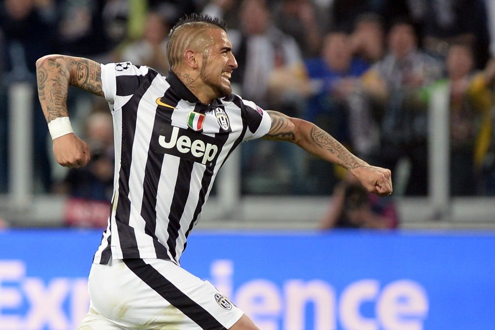 Arturo Vidal celebrates his winner. Photo: AP