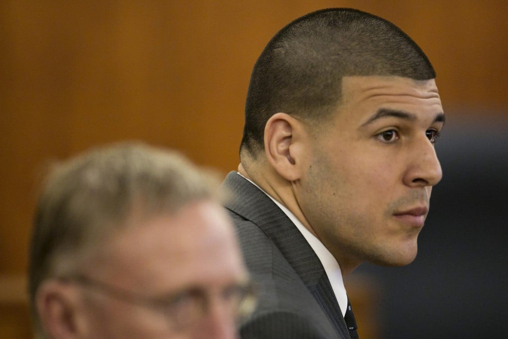 Aaron Hernandez in court (above) just before the guilty verdict was read out and his 27-year-old victim Odin Lloyd. Photo: AP